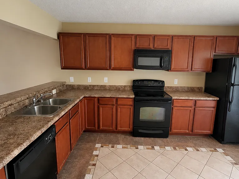 7001 Grandeur Ave — Photo 6