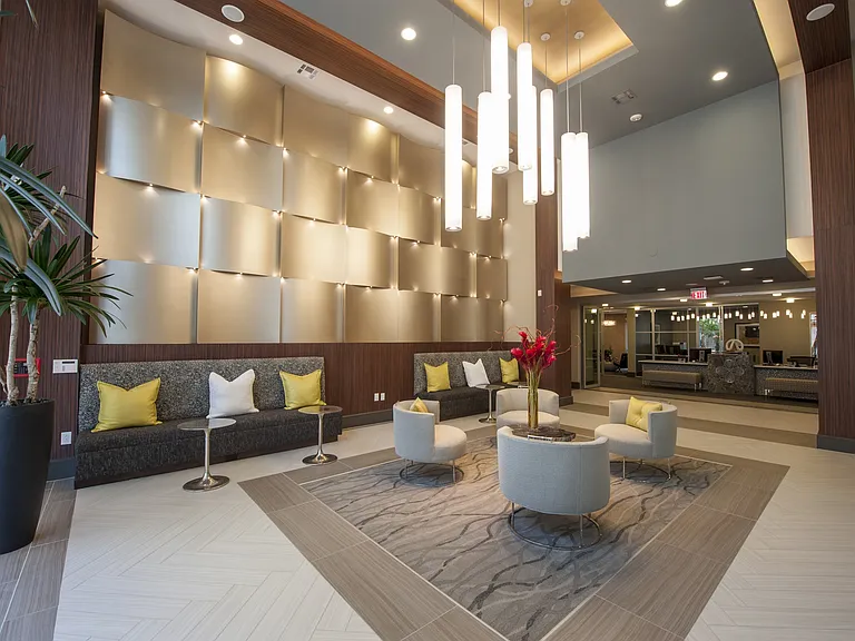Elegant seating area in a bright apartment lobby.