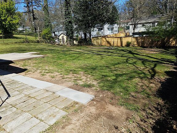 BACK YARD FENCED IN 2 PATIOS