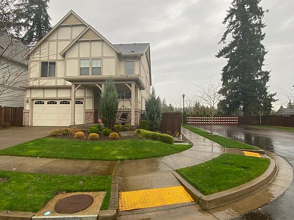 Exterior showing the corner lot with trees around