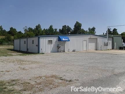 Office, kitchen/breakroom, bathrooms, warehouse, product assembly area.