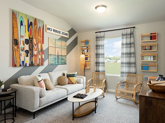 Enjoy game night in the spacious upstairs game room.