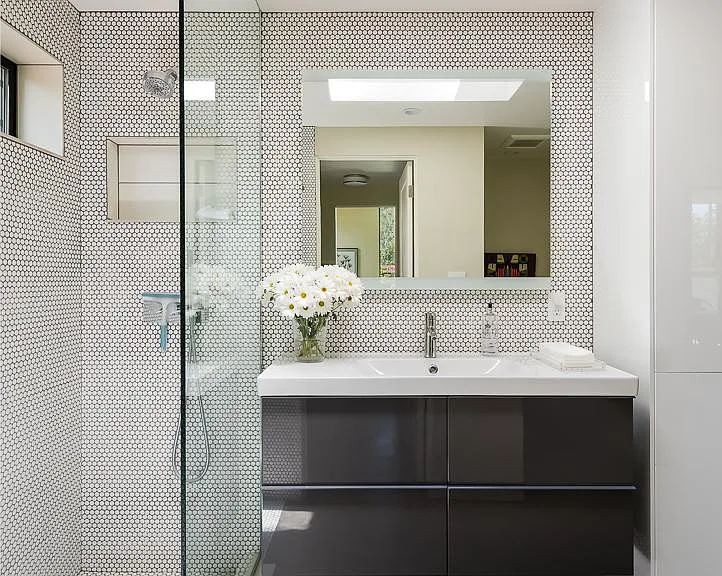 Bathroom with walk in shower and abundant storage