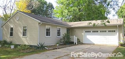 Street view of house
						:
						Easy maintainance: vinyl siding, newer roof, windows, new garage door/opener.