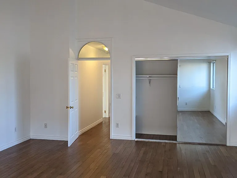 High vaulted ceiling in master.