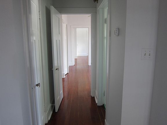 Hallway from second room- bath on the right