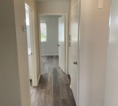 Large hall way with Linen closets