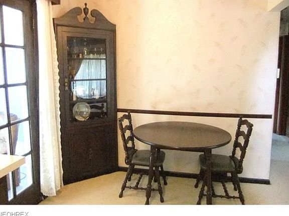 Dining Area Has Built-In Hutch Plus French Doors Lead To Florida Room.
