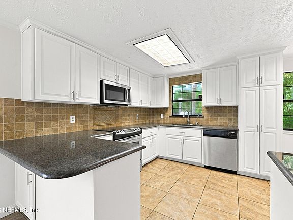 5th image of 1504 HAMMONDWOOD Road N