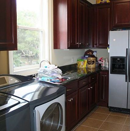 Large laundry room with 2nd fridge