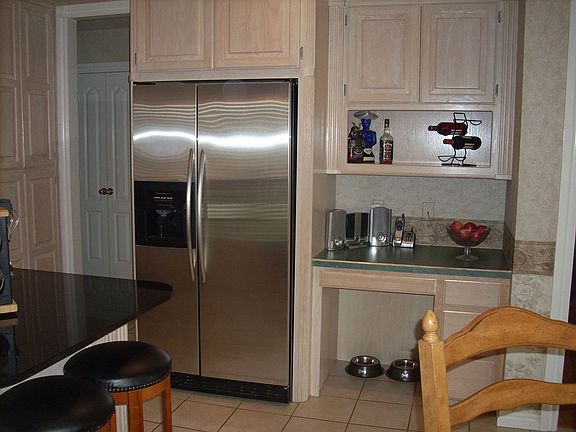 stainless steel refridgerator stays with home