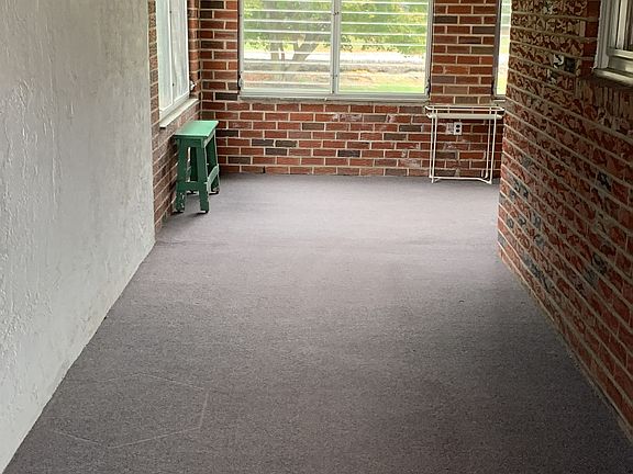 Enclosed Wrap-around Porch