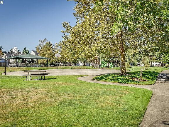 Community children's park with picnic area within 1 block.