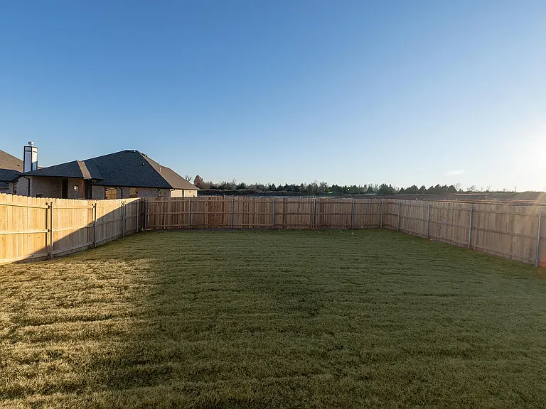 Backyard is fully fenced