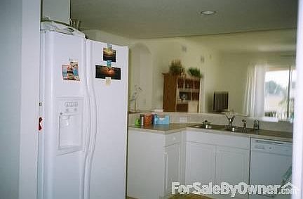 Full kitchen w/ eat at counter
						:
						GE appliances include side-by-side, range, dw and build in microwave