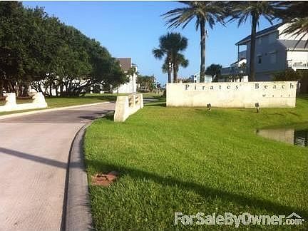Pirate's Beach
						:
						Community entrance to Priate's Beach