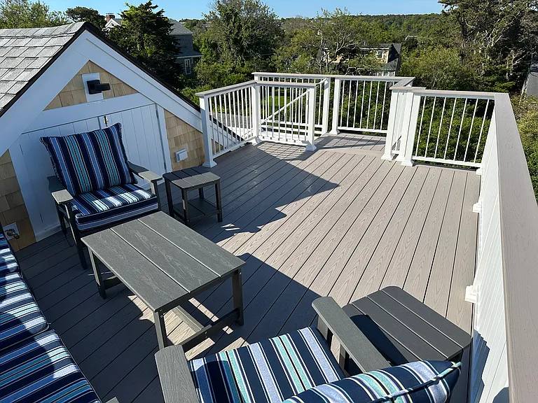 Third floor deck with sweeping views of Mill Pond, Priscilla Inlet and Beach, and Nauset Beach--perfect for sunsets and a bottle of wine
