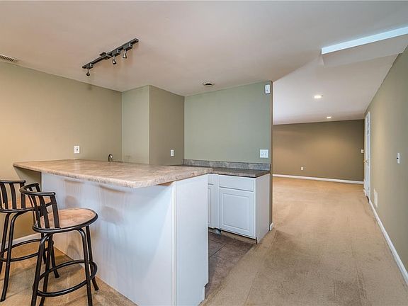 Finished lower level with wet bar