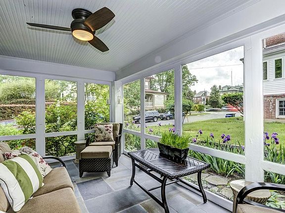 Screened porch with ceiling fan