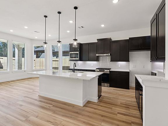 3rd image of 9738 Roaring River Falls Ln