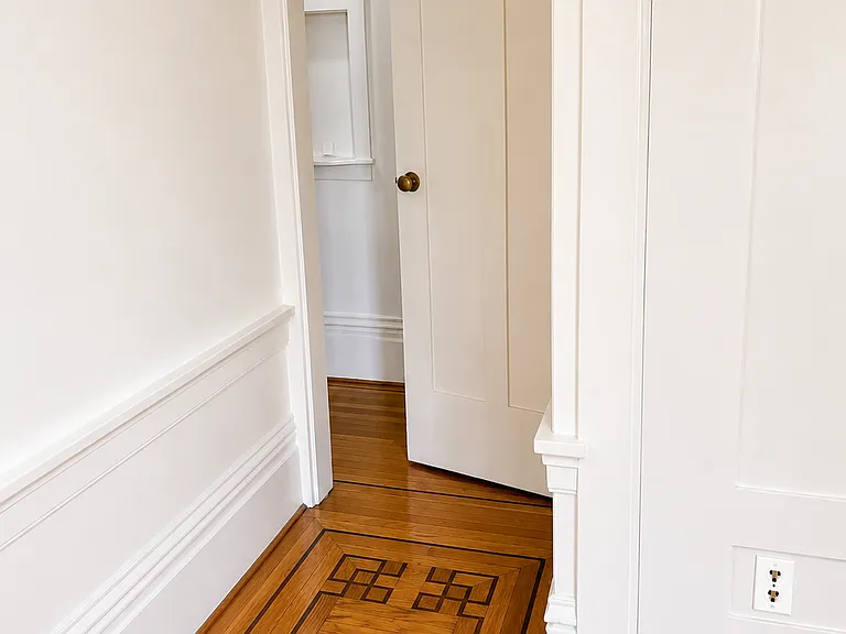 Hallway Leading to Bathroom and Entry
