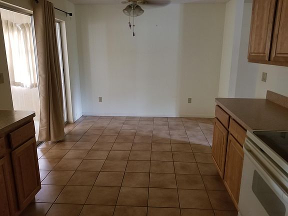 Standing in kitchen looking into dining area
