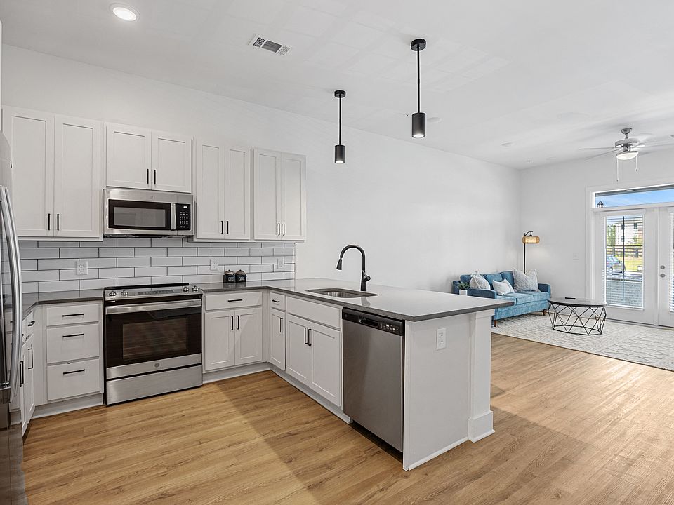 Kitchen with white shaker cabinetry