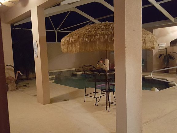 private pool in the center of the home. Pool can be accessed from every room through glass sliders. Pool is also viewible from every room in the home (except bathrooms)