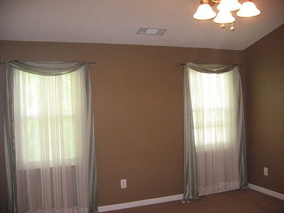 Master BR has trey ceiling w/remote control, brushed nickel & wood ceiling fa