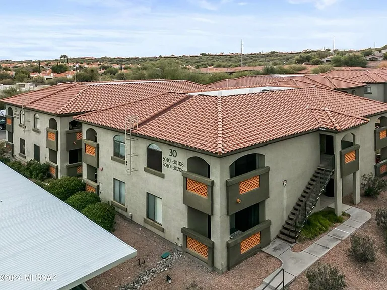Our unit is the upstairs, double-sided covered deck, just to the right of the "30..." sign