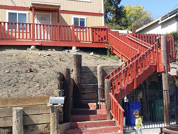 Large set of stairs to front door.