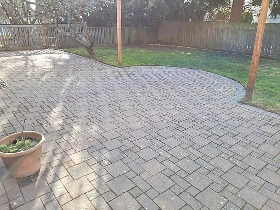 Back patio, fenced yard.