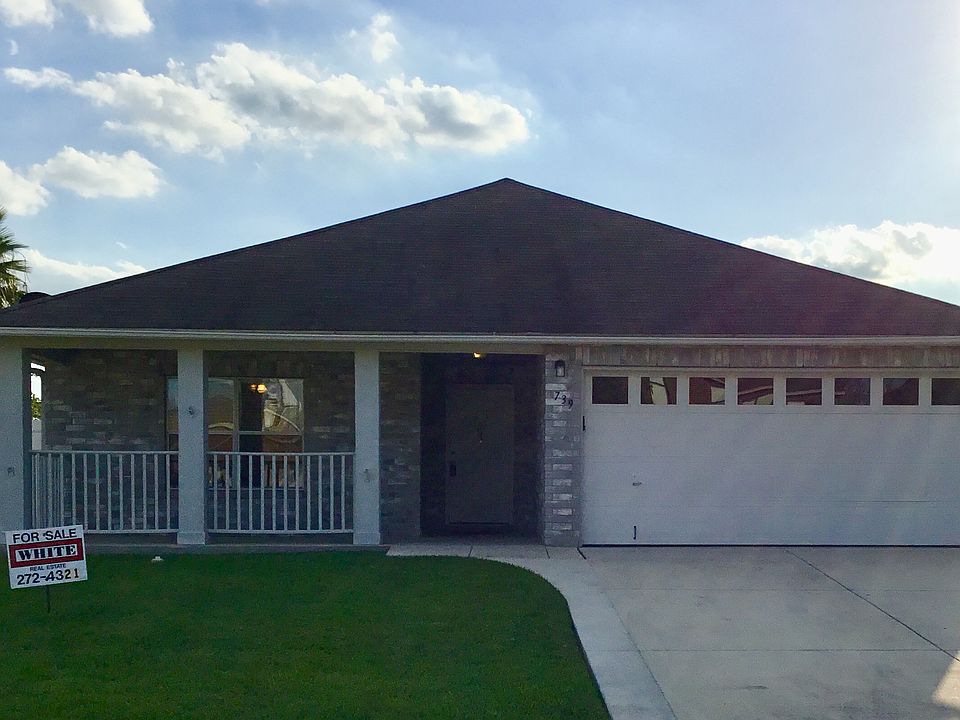 Covered porch & 2-car garage