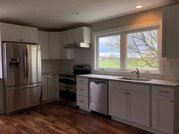 Large kitchen with beautiful views with dinette area. Nice