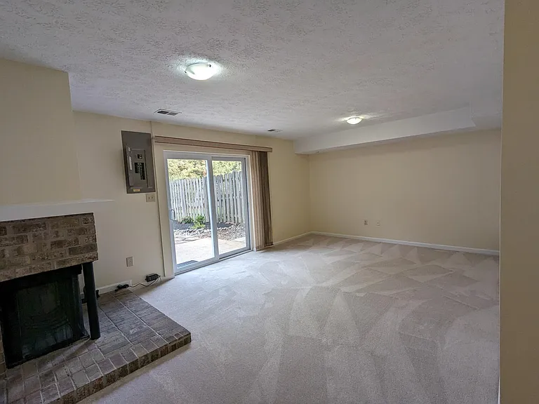 spacious family room with a walkout to the back yard - lower level