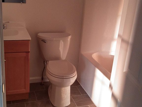 Hall bathroom with tub shower