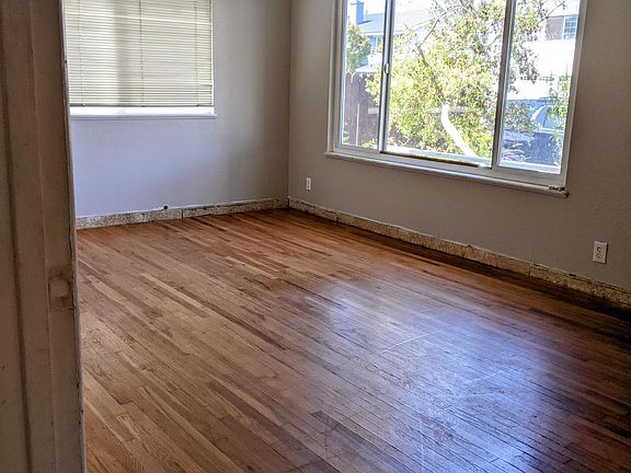 Good size living room - great light. One coat closet. Currently adding new baseboards and crown molding