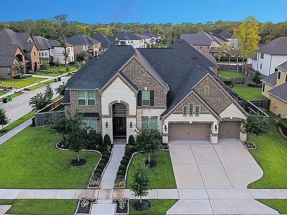 Parking is a snap in the three car attached garage and triple wide driveway! This home is perfect for multi-driver families.