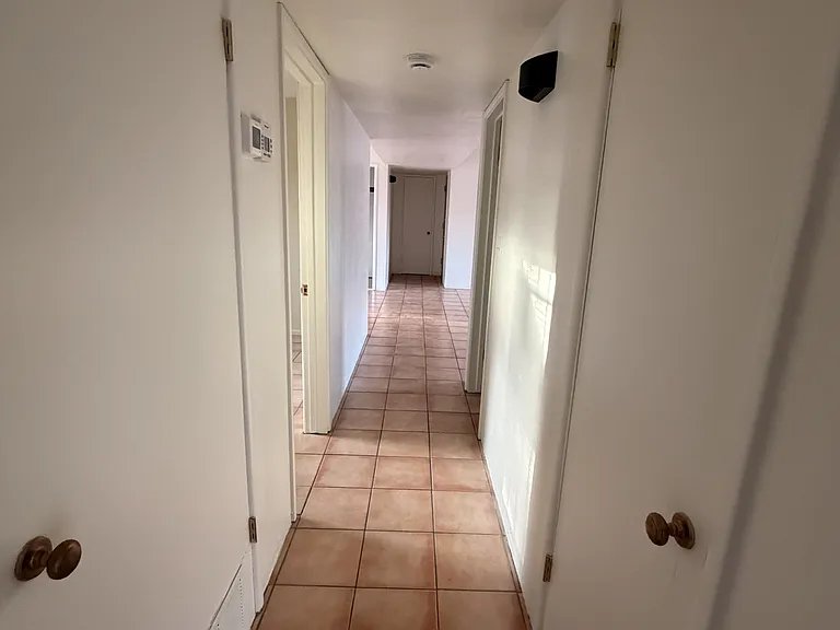 Hallway to bedrooms/bathrooms
