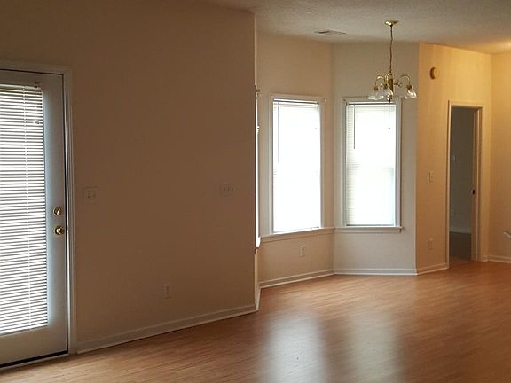 Living area and looking toward breakfast area