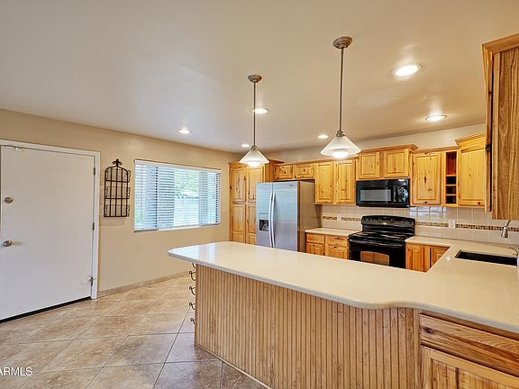 3rd image of 6805 E 2ND Street #11