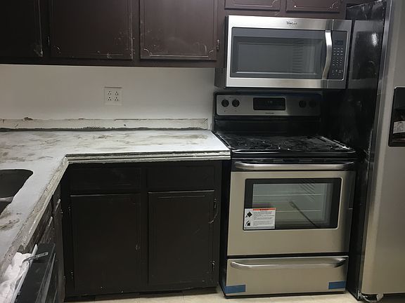 kitchen has stainless steel appliances