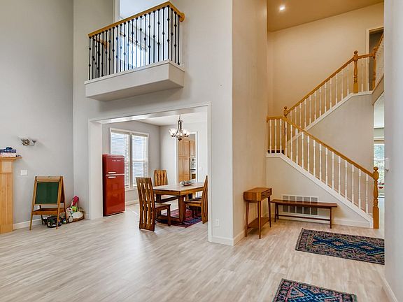 Beautiful tall ceilings with lots of light and a balcony from the den upstairs overlooking the living room and entry way. All new flooring on the main level.