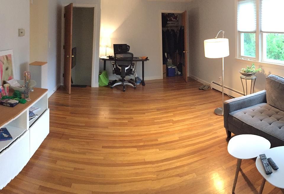 Living room with walk-in closet.