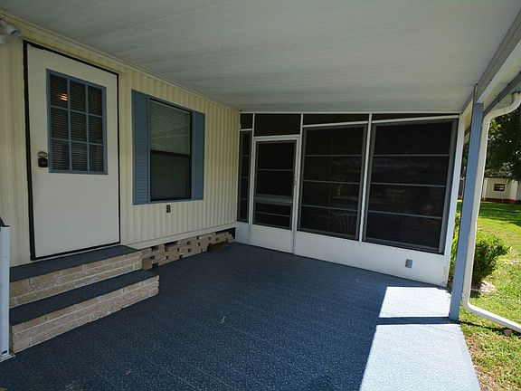 NICELY PAINTED CARPORT