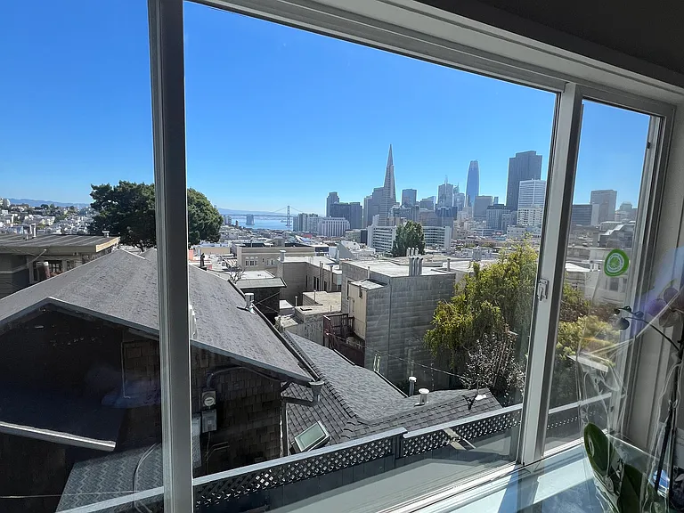 views of the bay, downtown, etc. kitchen, dining and living room (basically the entire house). meticiously maintained.