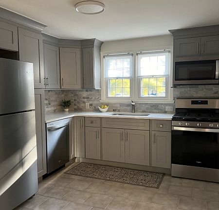 Brand New Kitchen - Stainless Steel Appliances, Granite Countertops, Tile Back Splash & Ample Cabinetry.