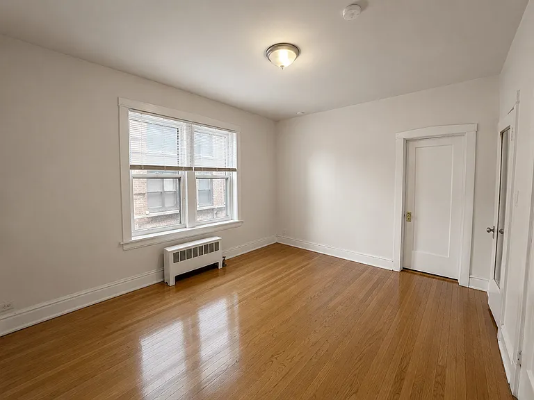 2nd bedroom- windows face North. Door into bathroom and door into reach-in closet