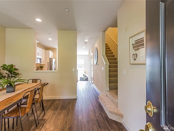 Entry leads to Dining Room with new luxury vinyl plank floor