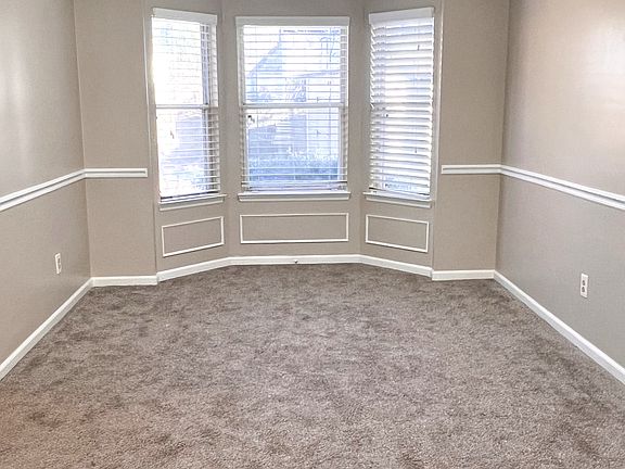 Newer Carpet in living room and dining room and new light fixture